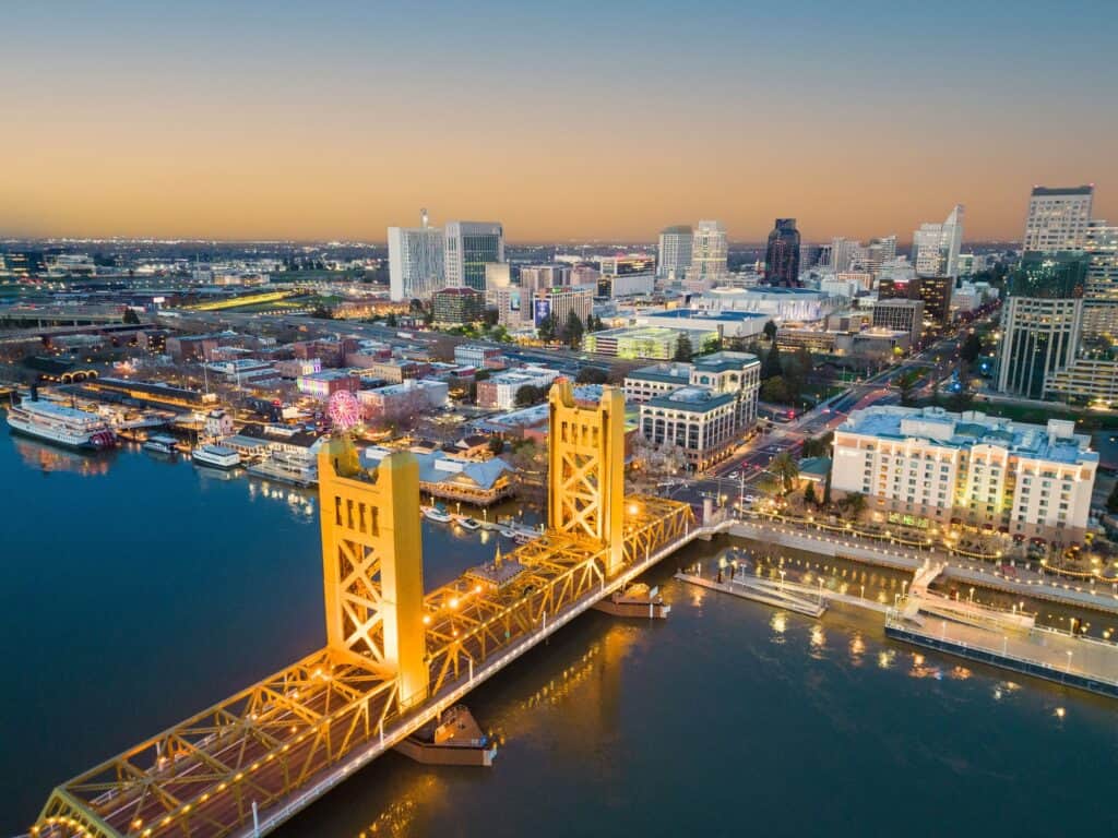 Aerial shot of the Tower Bridge spanning across the Sacramento River in California.